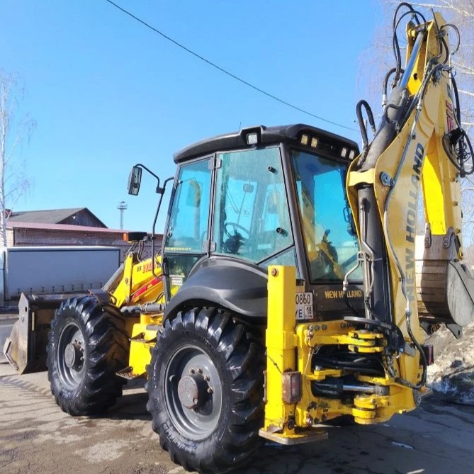 Экскаватор-погрузчик NEW HOLLAND B115B